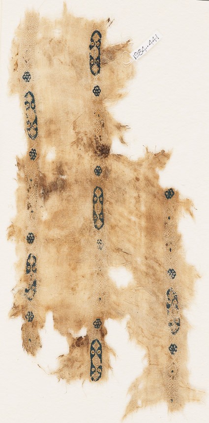 Textile fragment with cartouches and rosettesfront
