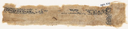 Textile fragment with vine scrollfront
