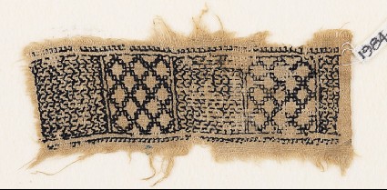 Textile fragment with chevrons and diamond-shapesfront