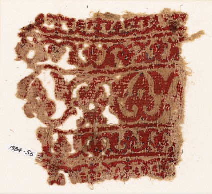 Textile fragment with bands of vines and flowersfront
