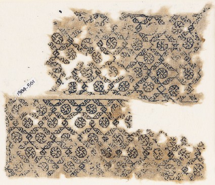 Textile fragment with diagonal grid containing rosettesfront