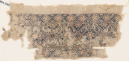 Textile fragment with diamond-shapes containing starsfront