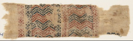 Textile fragment with two parallel bands filled with chevronsfront