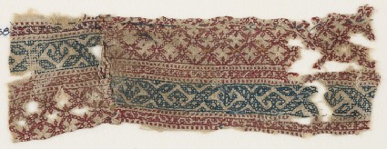 Textile fragment with grid and vinesfront