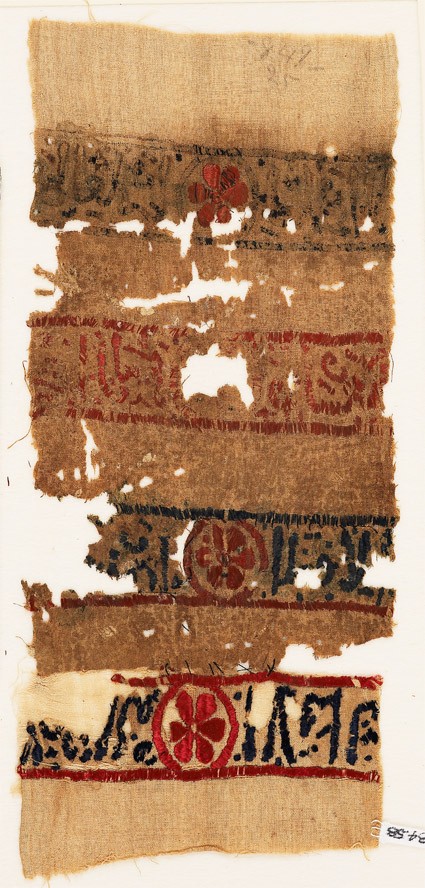 Textile fragment with bands of inscription and blazonsfront