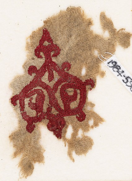 Textile fragment with tendrils and trefoil peakfront