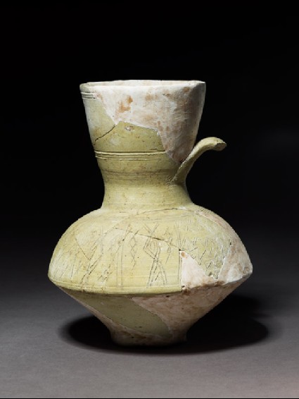 Jug with incised decorationside