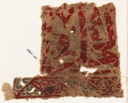 Textile fragment with inscription and arabesque tendrils, possibly from a wall hangingfront