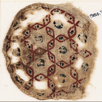 Roundel textile fragment with interlacing hexagonsfront