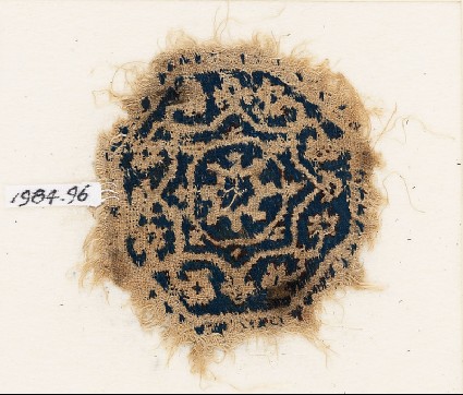 Textile fragment with an octagon, rosette, and vinefront