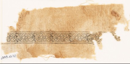 Textile fragment with band of interlacing and four-leaved tendrilsfront