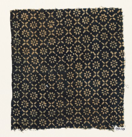 Textile fragment with flowers, dots, and rosettesfront