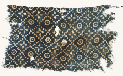 Textile fragment with dots, quatrefoils, and circlesfront