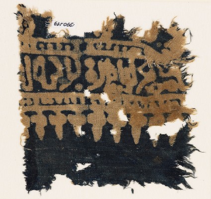 Textile fragment with Arabic-style script, dots, and stylized leaves or treesfront