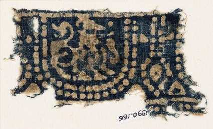 Textile fragment with pearl garland and stylized mythical animalfront