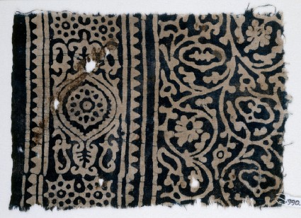 Textile fragment with vines and tendrils, a medallion, and rosettesfront