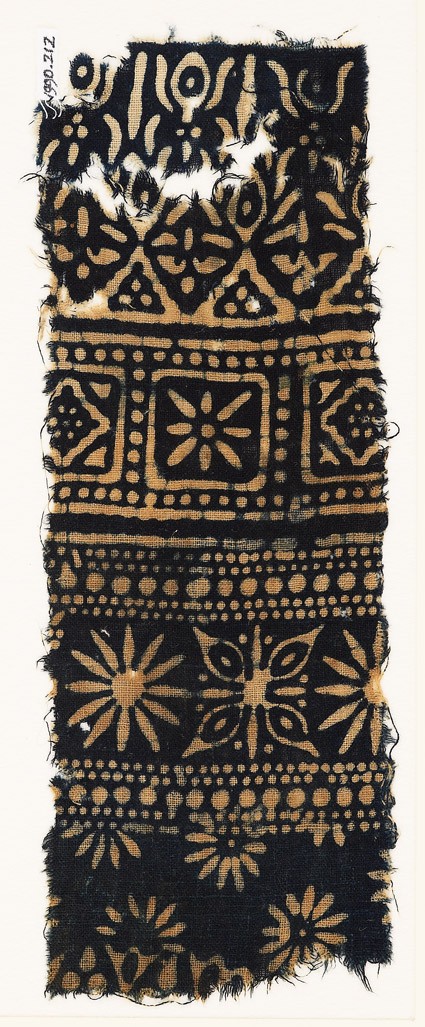 Textile fragment with rosettes, quatrefoil, diamond-shapes, and stylized treesfront
