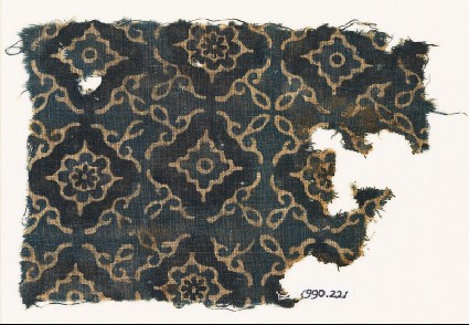 Textile fragment with lobed diamond-shapes and stylized leavesfront