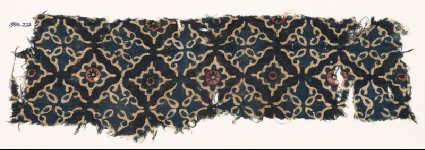 Textile fragment with lobed diamond-shapes and leavesfront