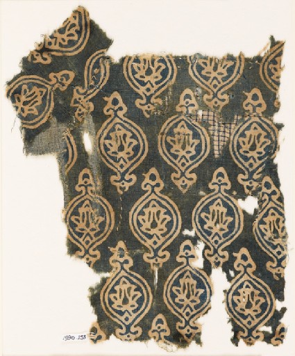 Textile fragment with ovals and stylized floral shapesfront