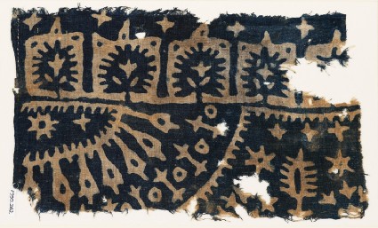 Textile fragment with trees, stars, and radiating shapesfront