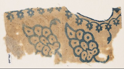 Textile fragment from a dress, possibly with grapesfront