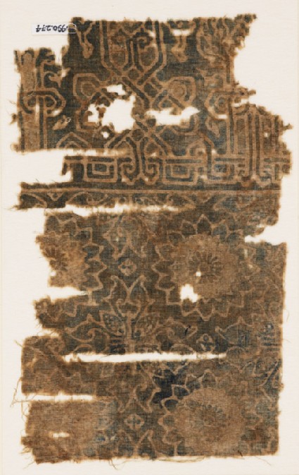 Textile fragment with rosettes, quatrefoils, and interlace based on scriptfront
