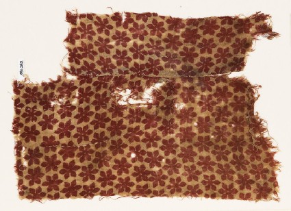Textile fragment with linked rosettesfront