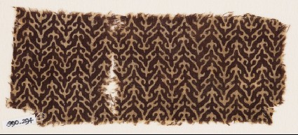 Textile fragment with linked chevrons and trefoilsfront