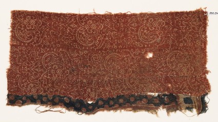 Textile fragment with wing-shaped flowers or vases, tendrils, and rosettesfront