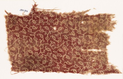 Textile fragment with tendrils, leaves, and dotsfront