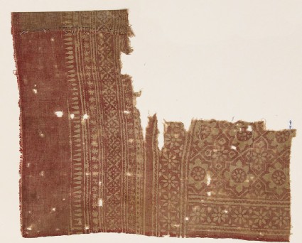 Textile fragment with rosettes set into linked starsfront