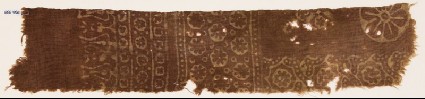 Textile fragment with small and large rosettesfront