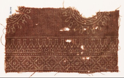 Textile fragment with parts of circles, stylized bodhi leaves, and diamond-shapesfront