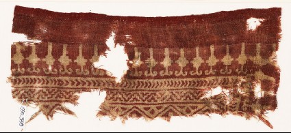 Textile fragment with stylized bodhi leaves, chevrons, and zigzagsfront