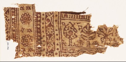 Textile fragment with stylized trees and three-layered rosettesfront
