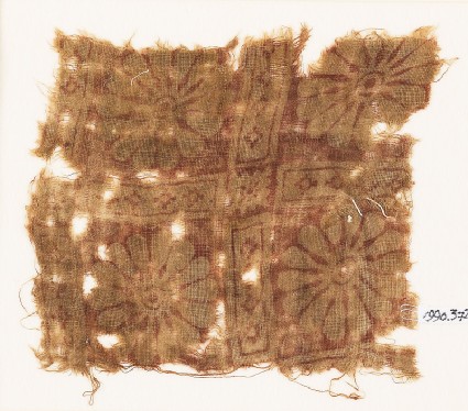 Textile fragment with rosettes in a gridfront