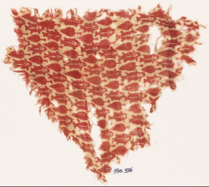 Textile fragment with fish and leavesfront