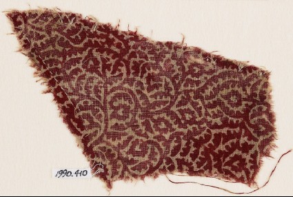 Textile fragment with leaves and flower-heads, possibly from a garmentfront