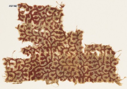 Textile fragment with linked tendrils and leavesfront