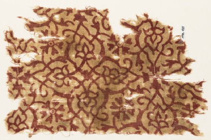 Textile fragment with stylized tendrils and flowersfront