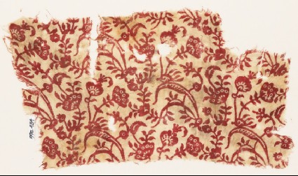 Textile fragment with plants, leaves, and flowersfront
