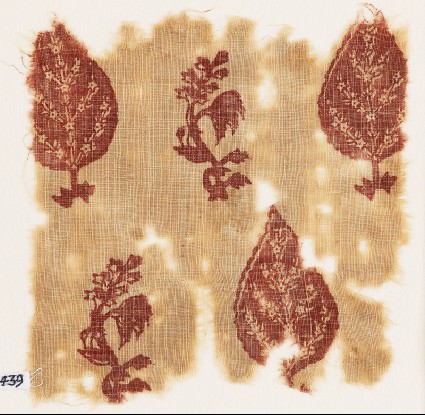 Textile fragment with trees and flowering plantsfront