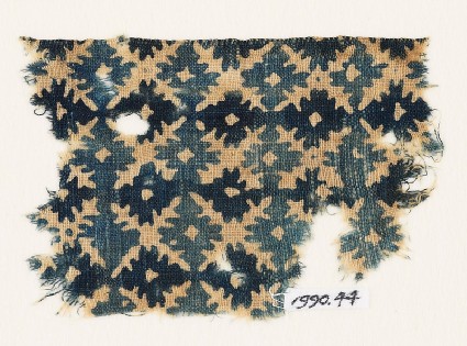 Textile fragment with serrated crossesfront