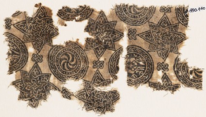 Textile fragment with spirals in braided circles, and starsfront