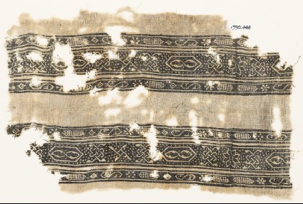 Textile fragment with bands of S-shapes, cartouches, stars, and interlacefront