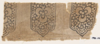 Textile fragment with tab-shapes, trefoils, and dotsfront