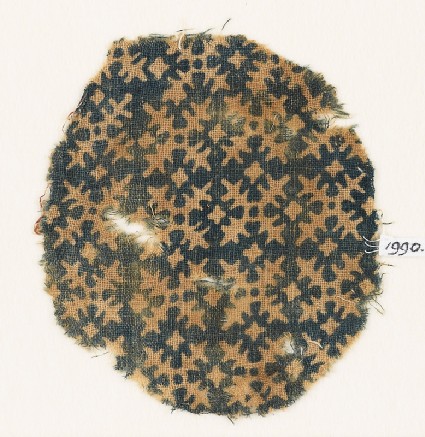 Textile fragment with serrated crossesfront