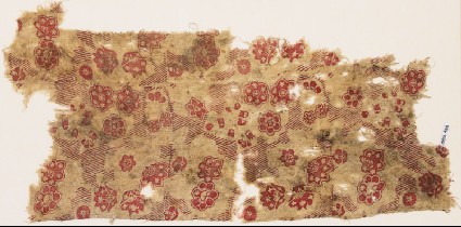 Textile fragment with rosettes and flower-headsfront