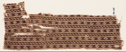 Textile fragment with linked S-shapes, squares, and raysfront